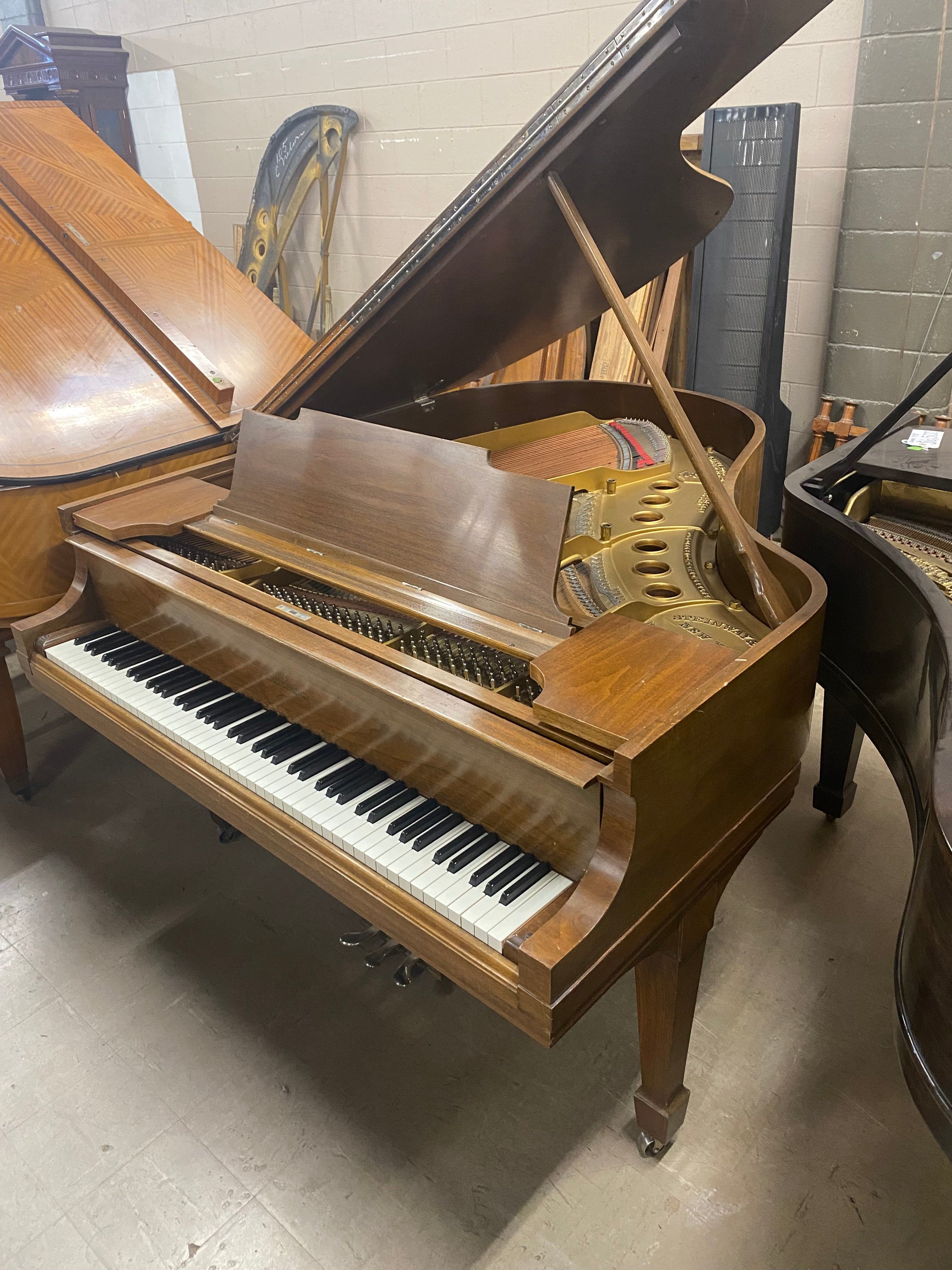 Steinway model M 5’7” circa 1924 walnut grand piano.